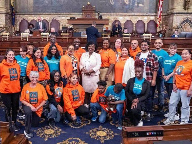 Group of students wearing "Not One More" gear in Harrisburg.